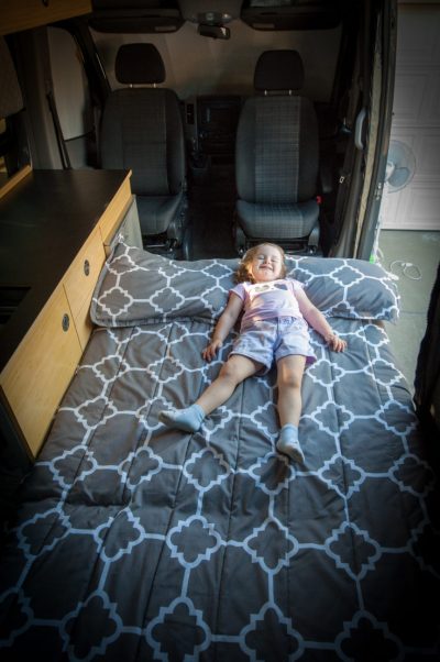 european style van interior with folding rock n roll bed